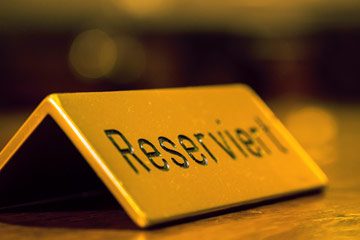 Schild mit der Aufschrift "Reservierung"